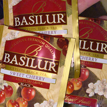 Load image into Gallery viewer, Basilur Magic Fruits - Sweet Cherry Black Loose Tea in Metal tin 100g and tea bags (25/100)